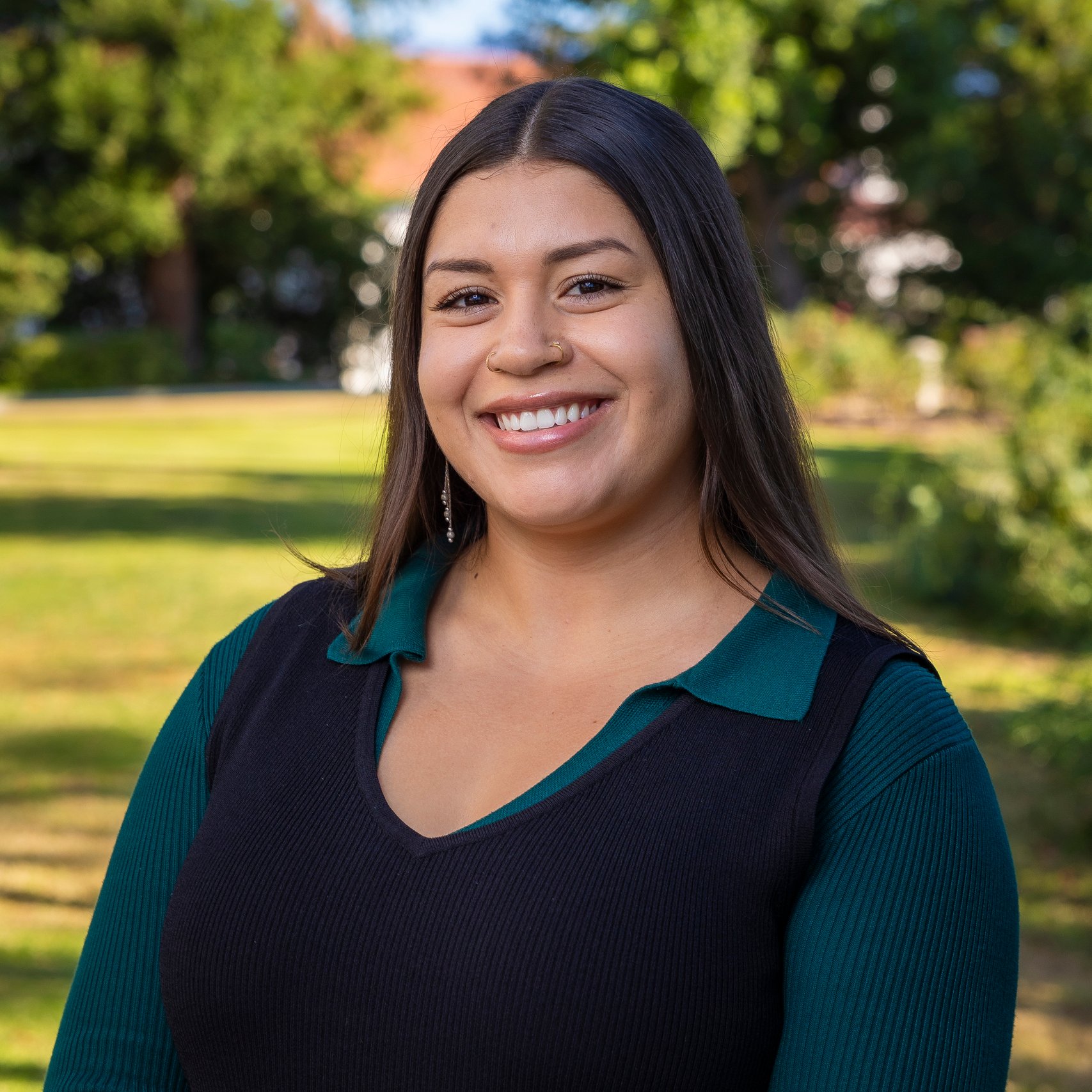a woman smiling at camera