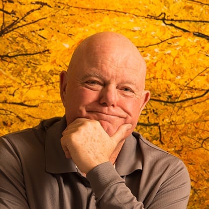 a man with his hand on his chin