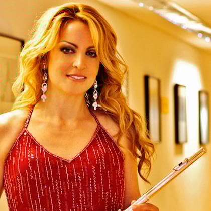 a person holding a flute