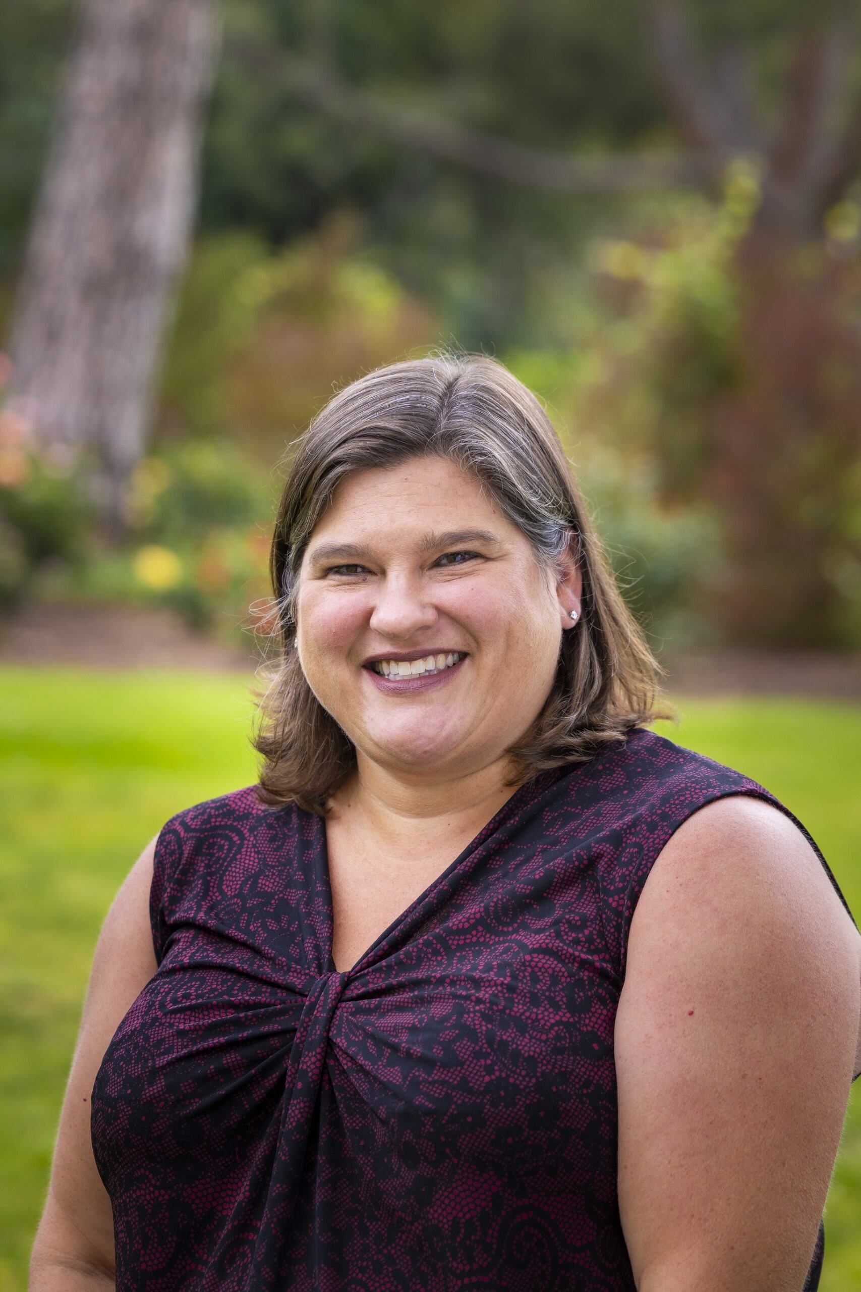 a woman smiling at camera