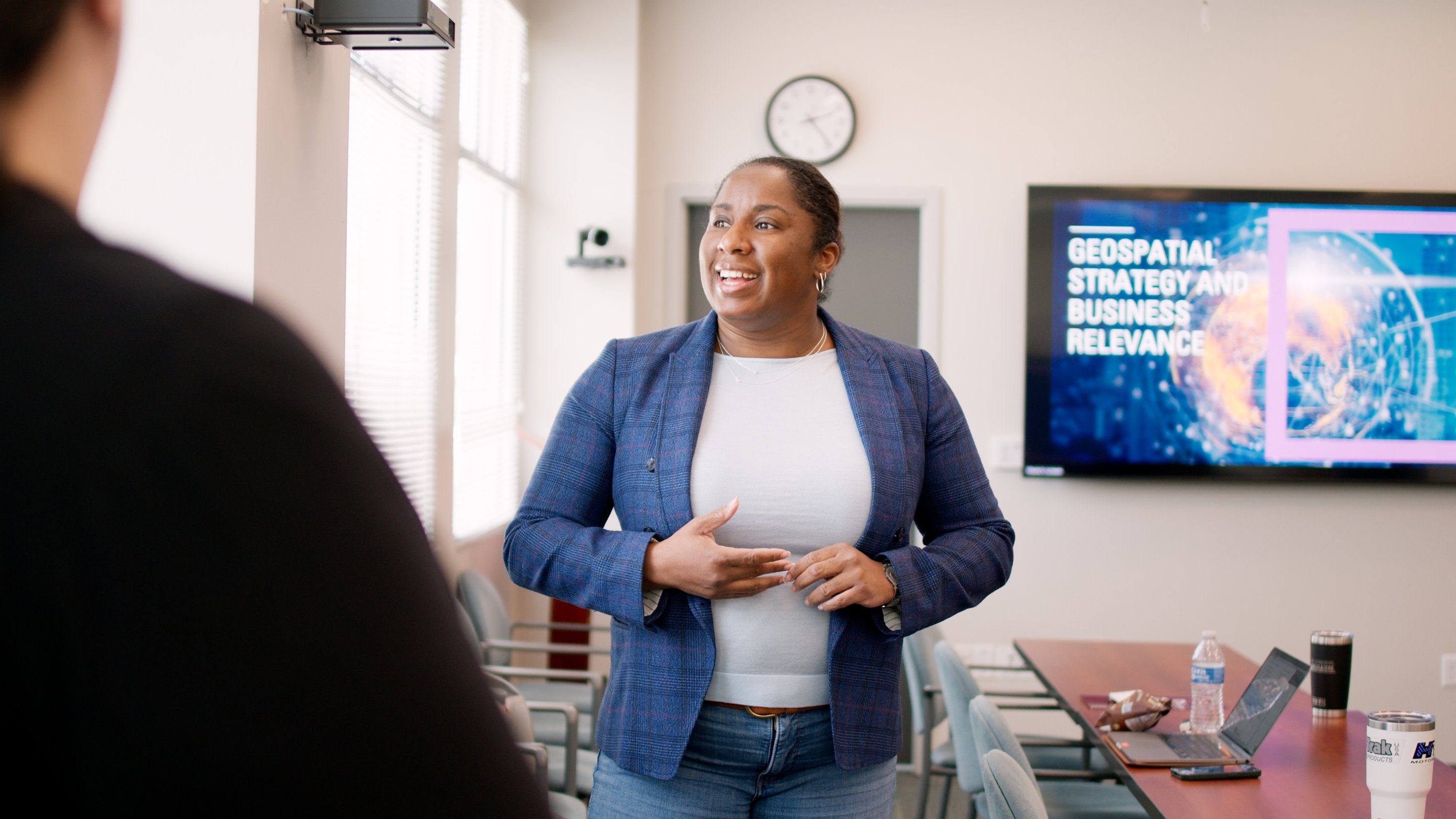 a woman in a blue blazer