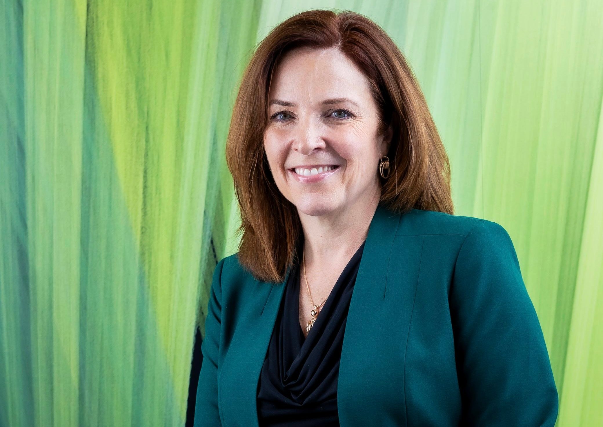 a woman smiling at camera