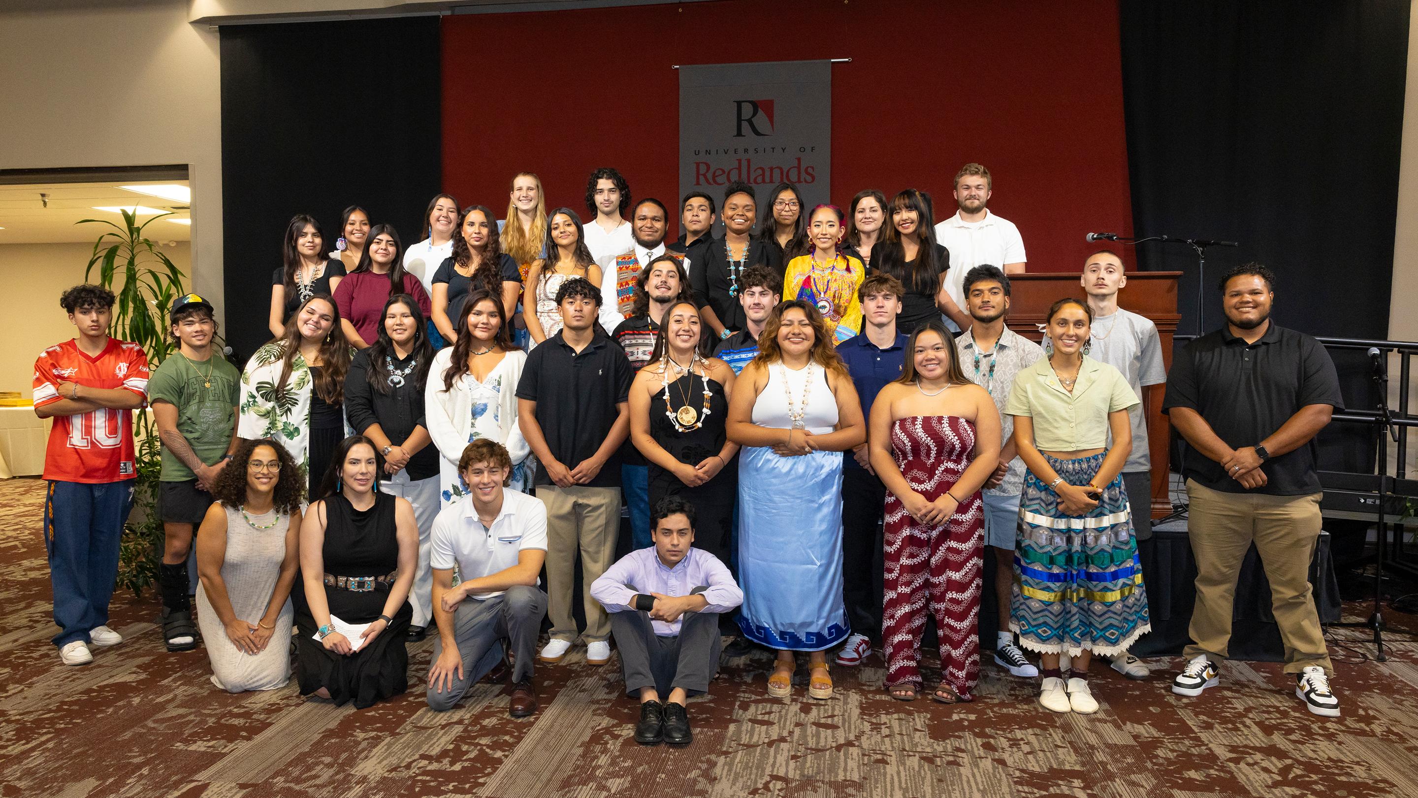 a group of people posing for a photo