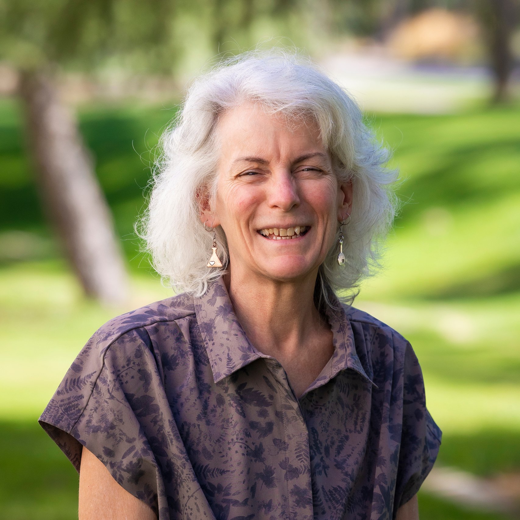 a woman smiling at camera
