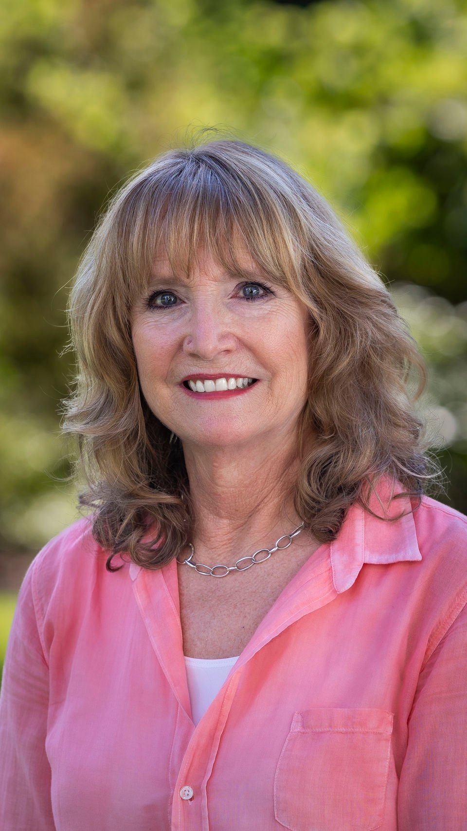 a woman smiling for a picture