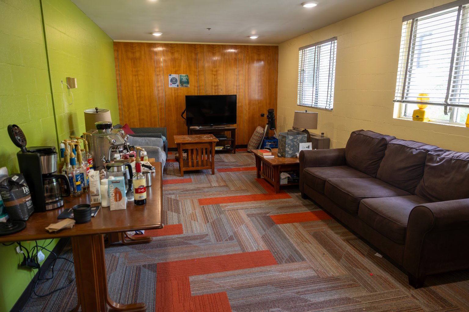 a living room with a couch and coffee table