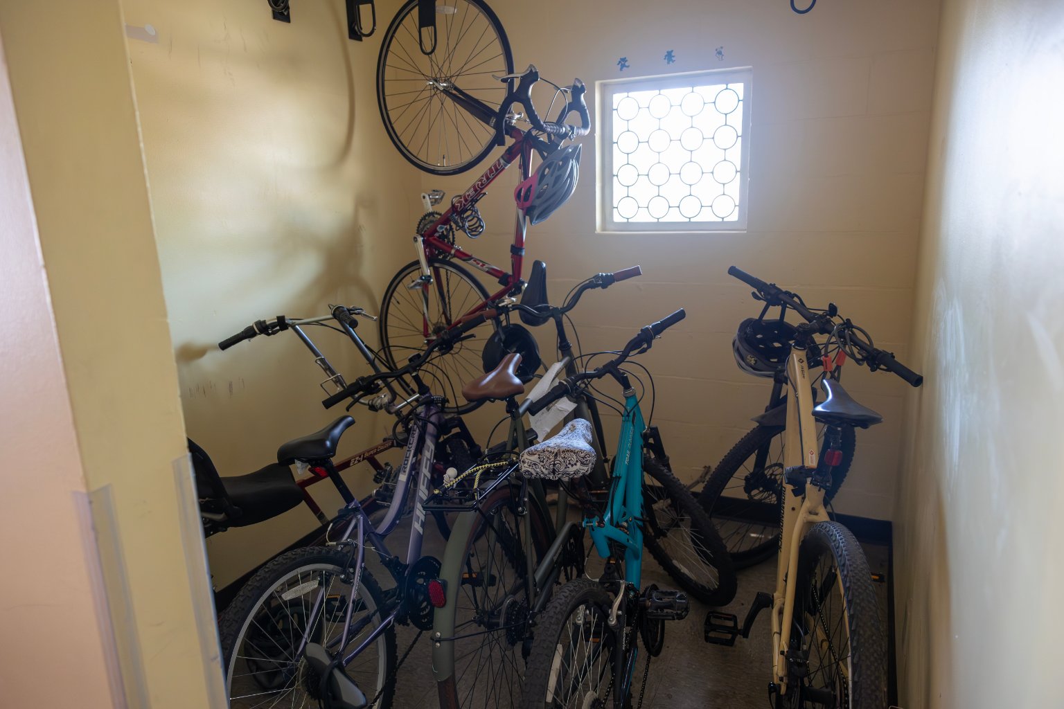 a group of bicycles in a room