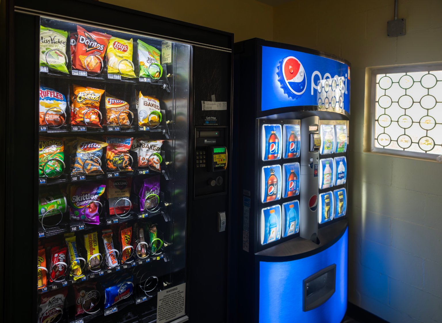 a vending machine with snacks in it