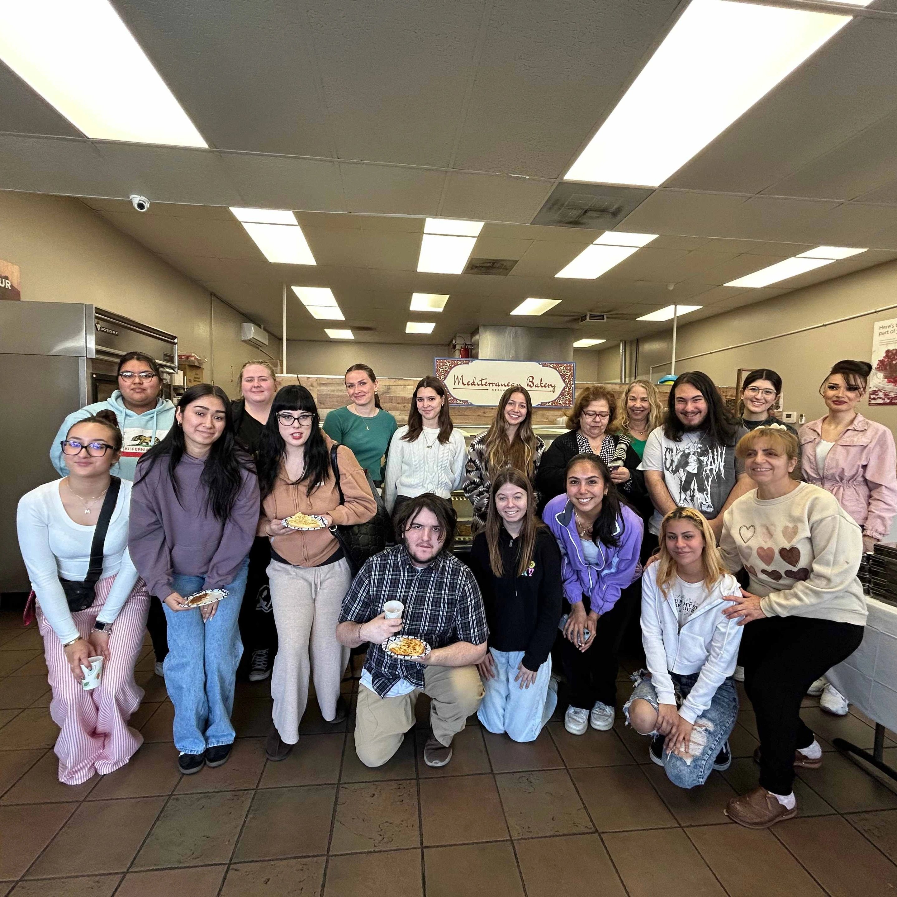 a group of people posing for a photo