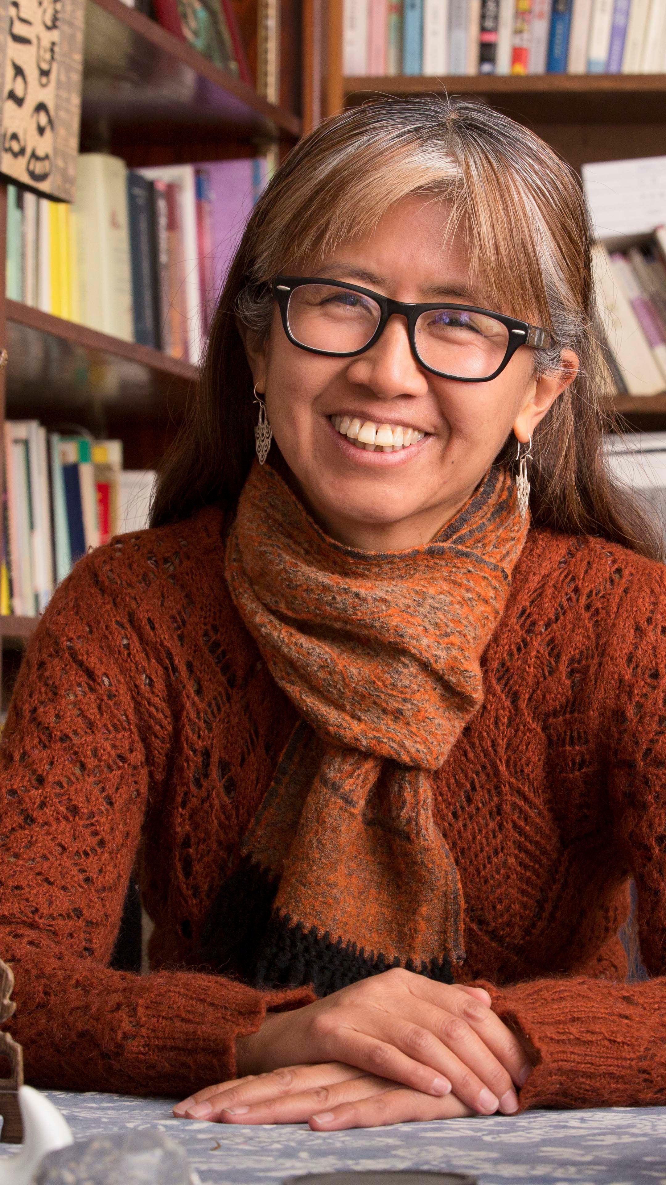 a woman smiling at camera