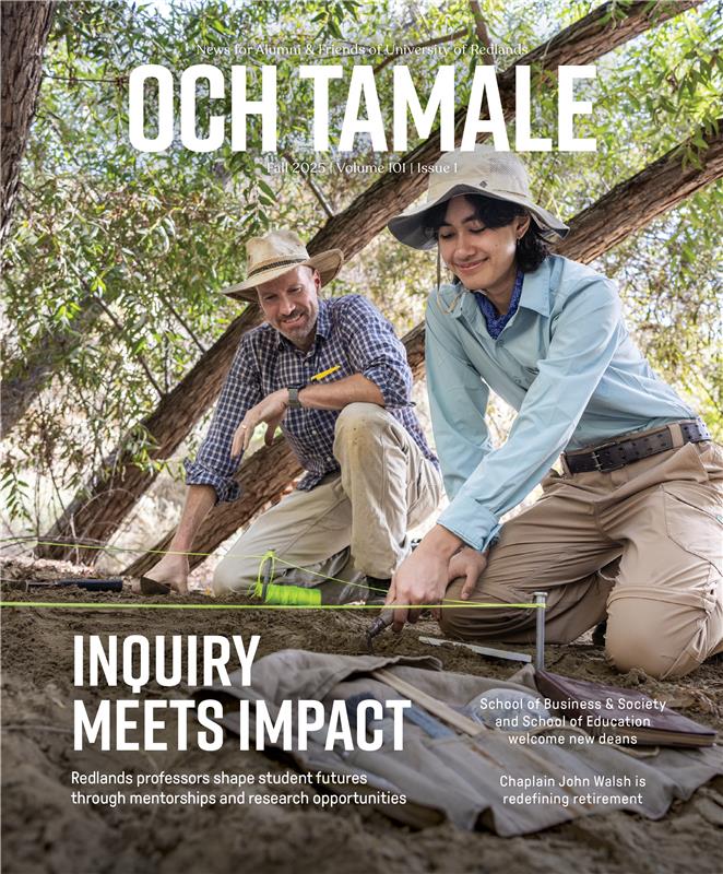 a man and woman on a rock