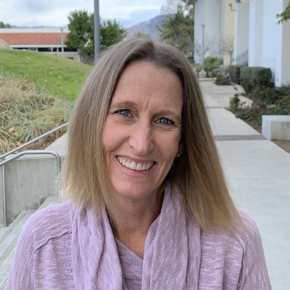 a woman smiling at camera