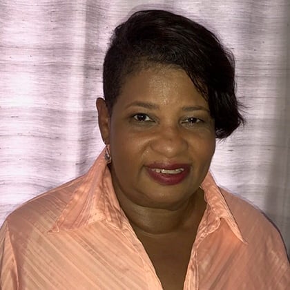 a woman smiling for a picture