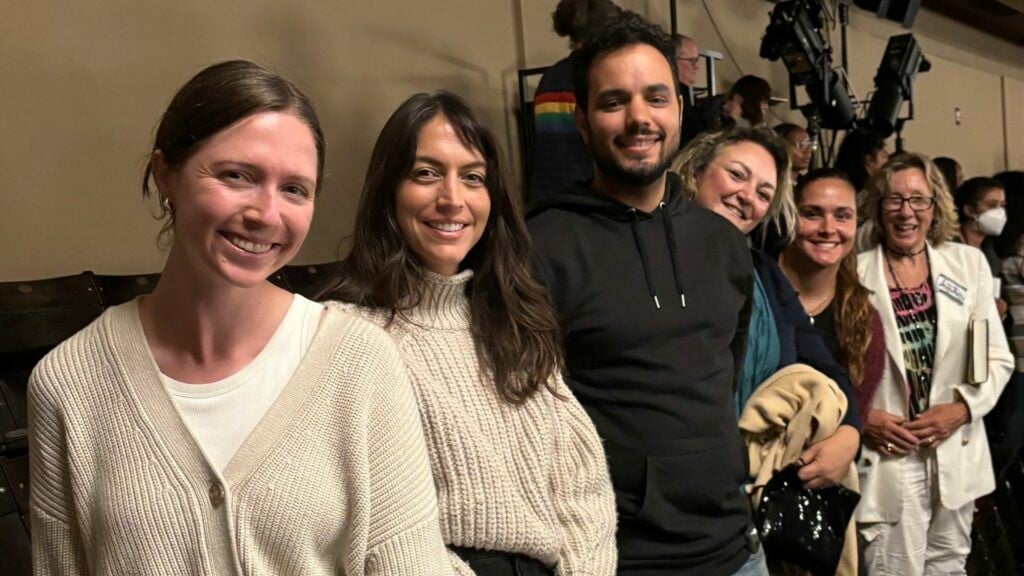 a group of people posing for a photo