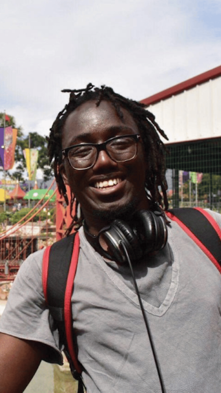 a man with headphones around his neck