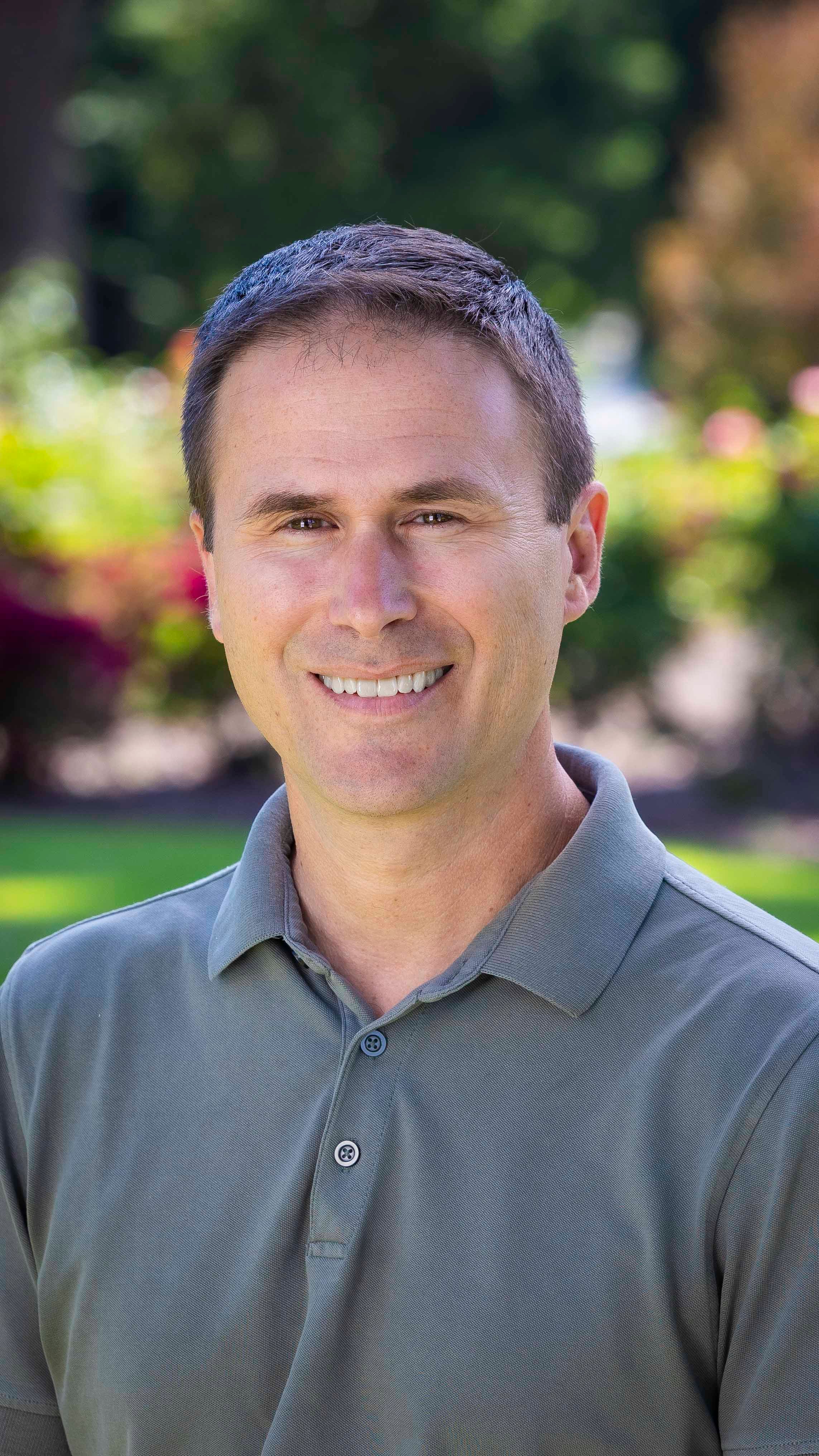 a man smiling for a picture