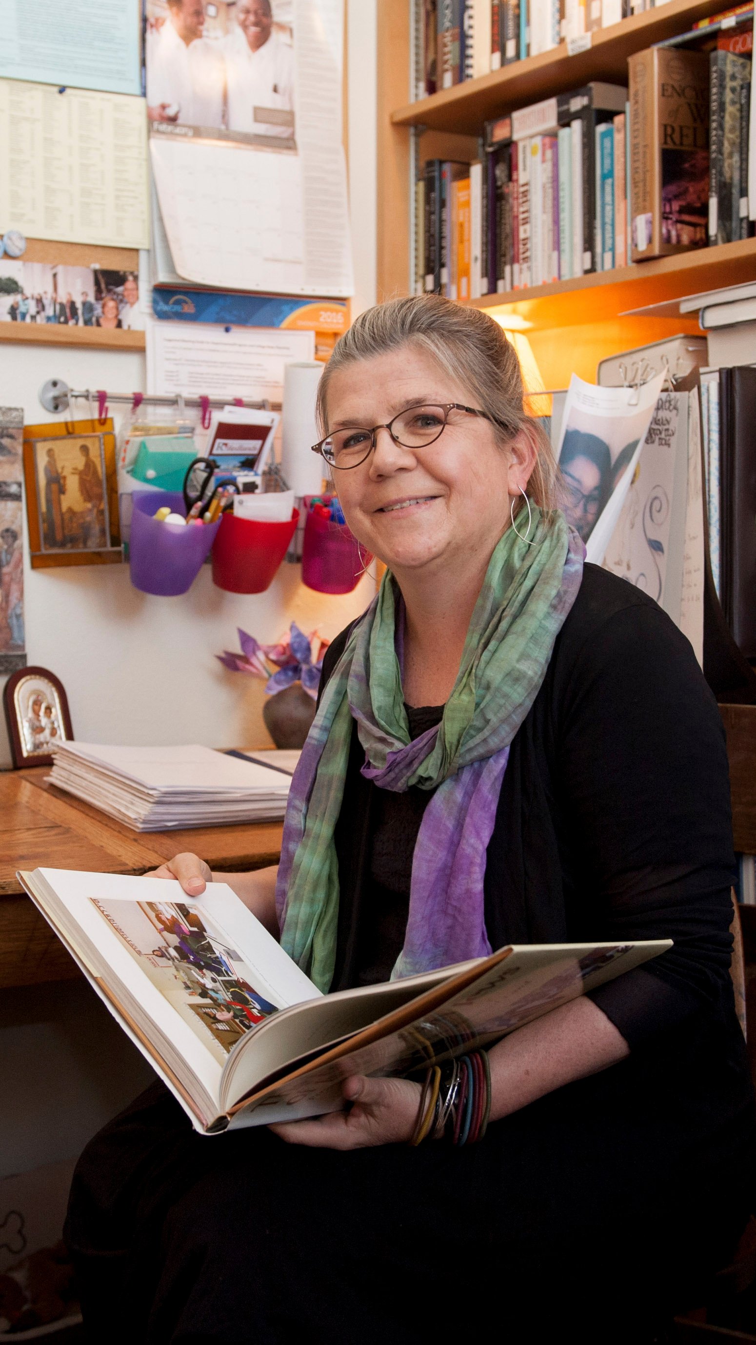 a woman holding a book