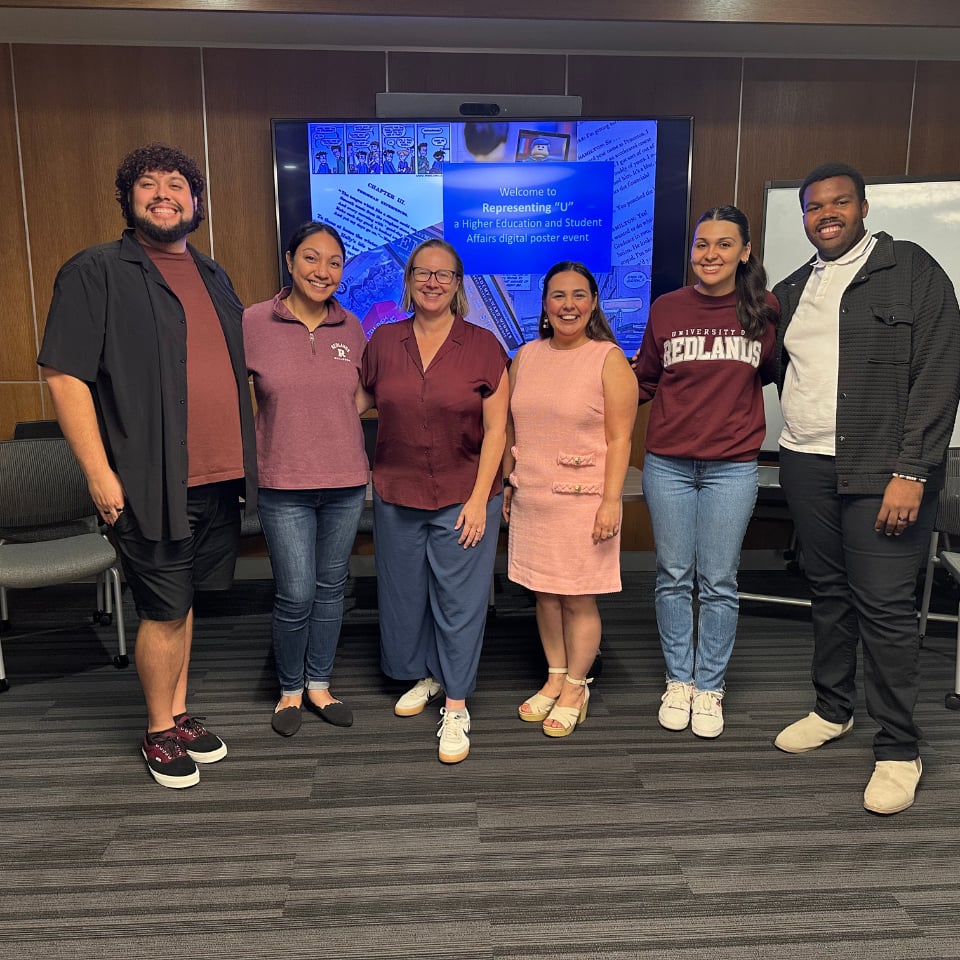 a group of people posing for a photo
