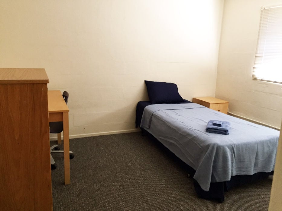 a small bed in a room