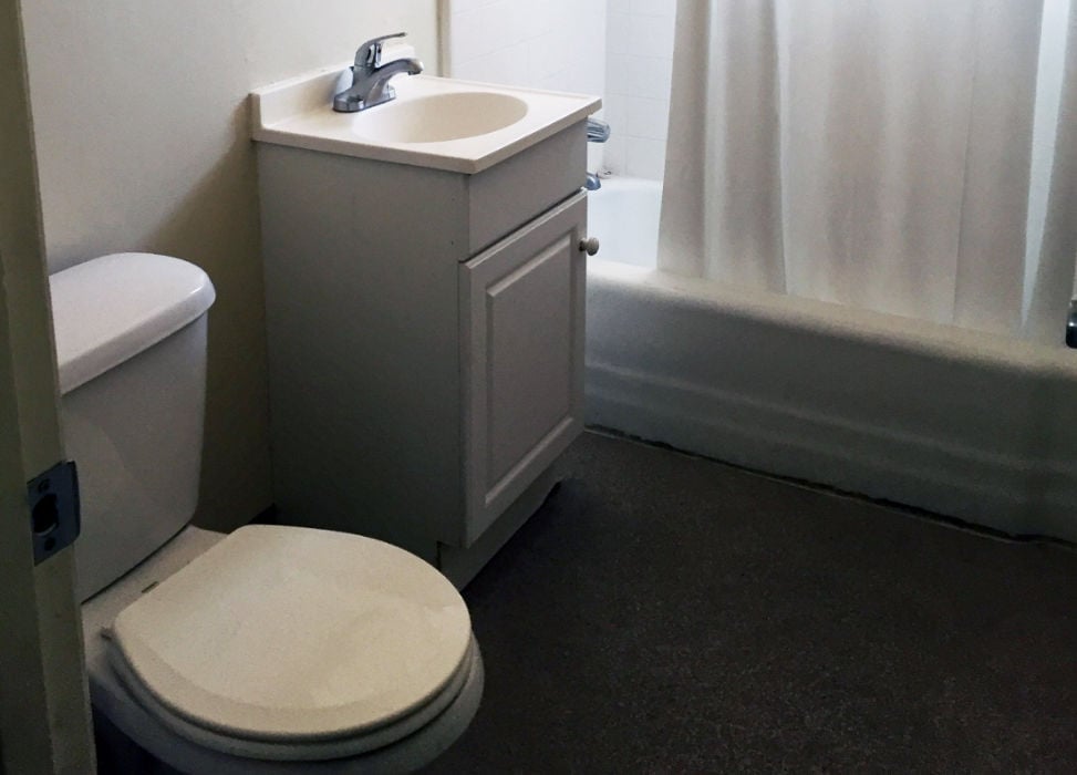 a bathroom with a sink and toilet