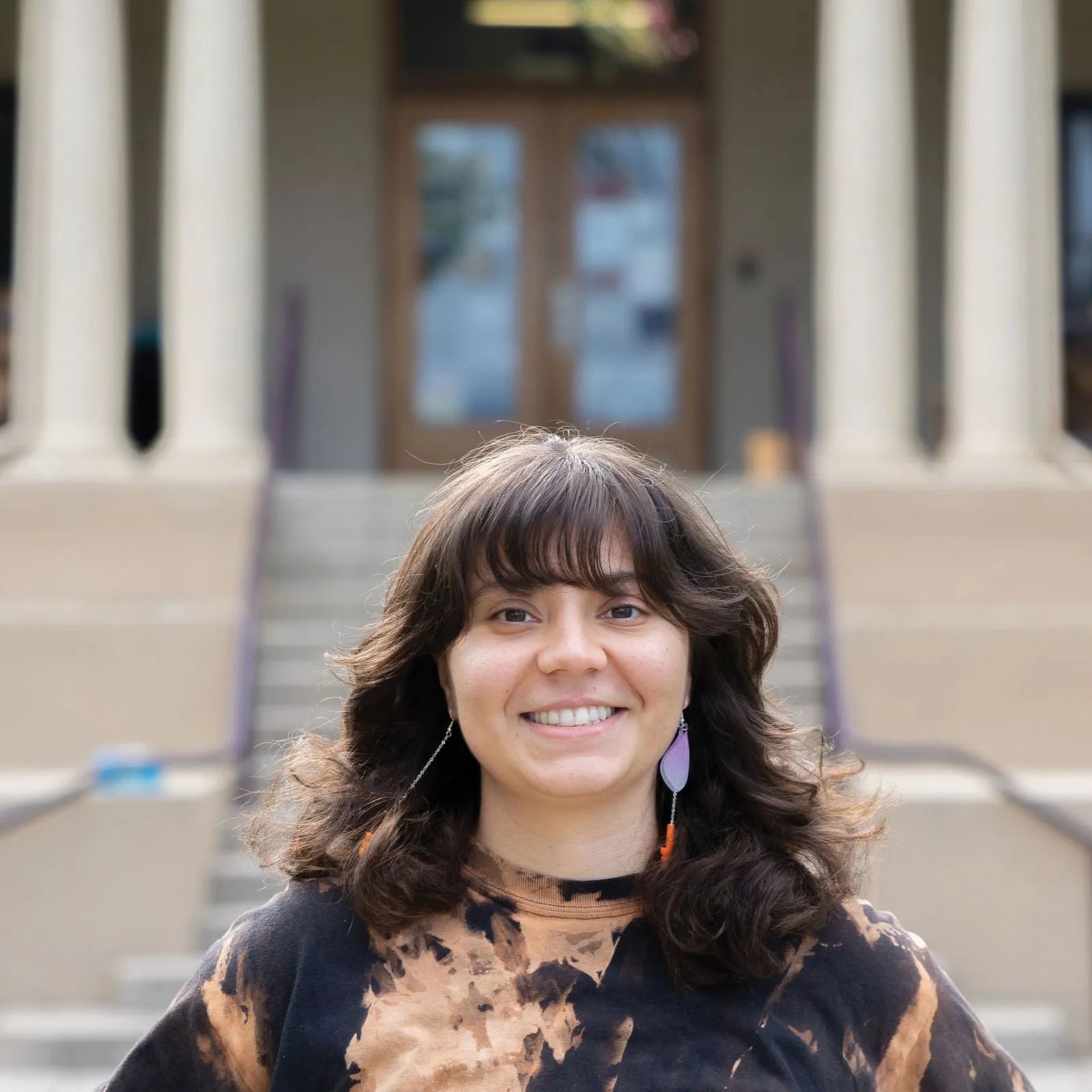 a woman smiling at camera