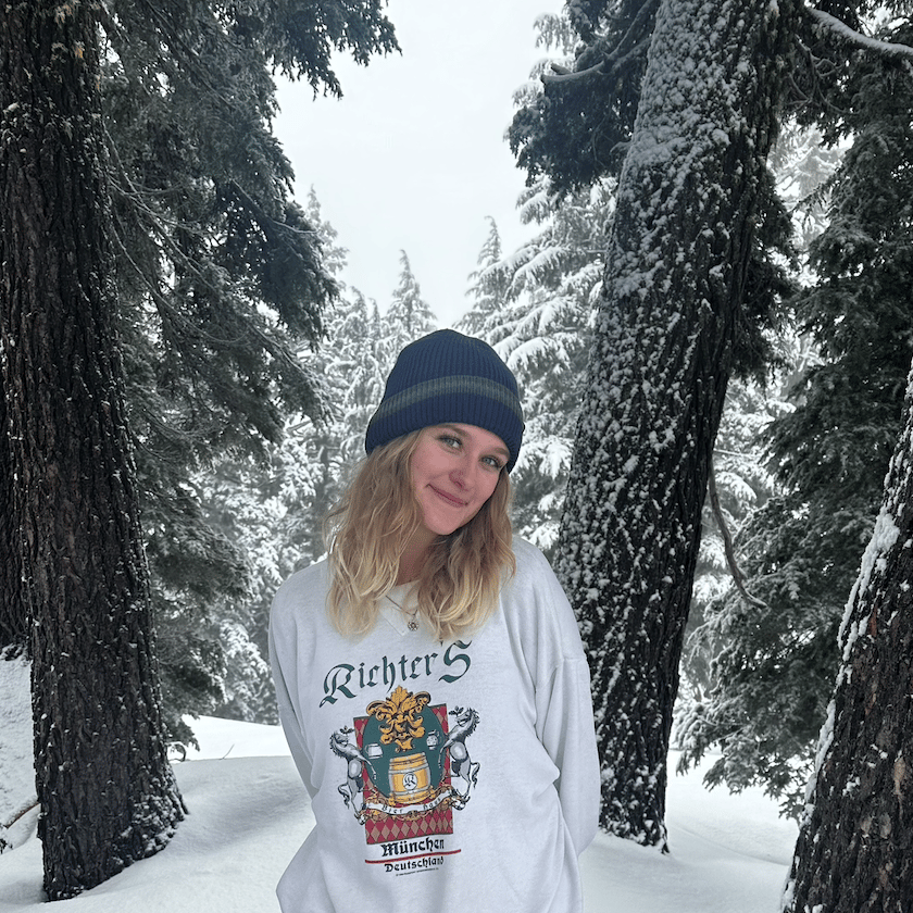a woman standing in snow