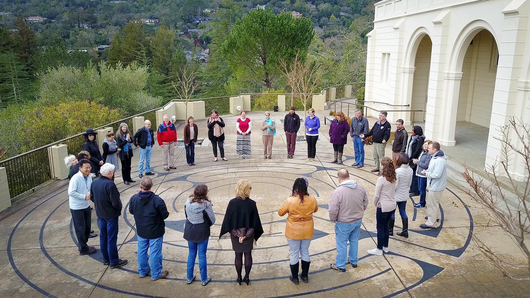 a group of people standing in a circle