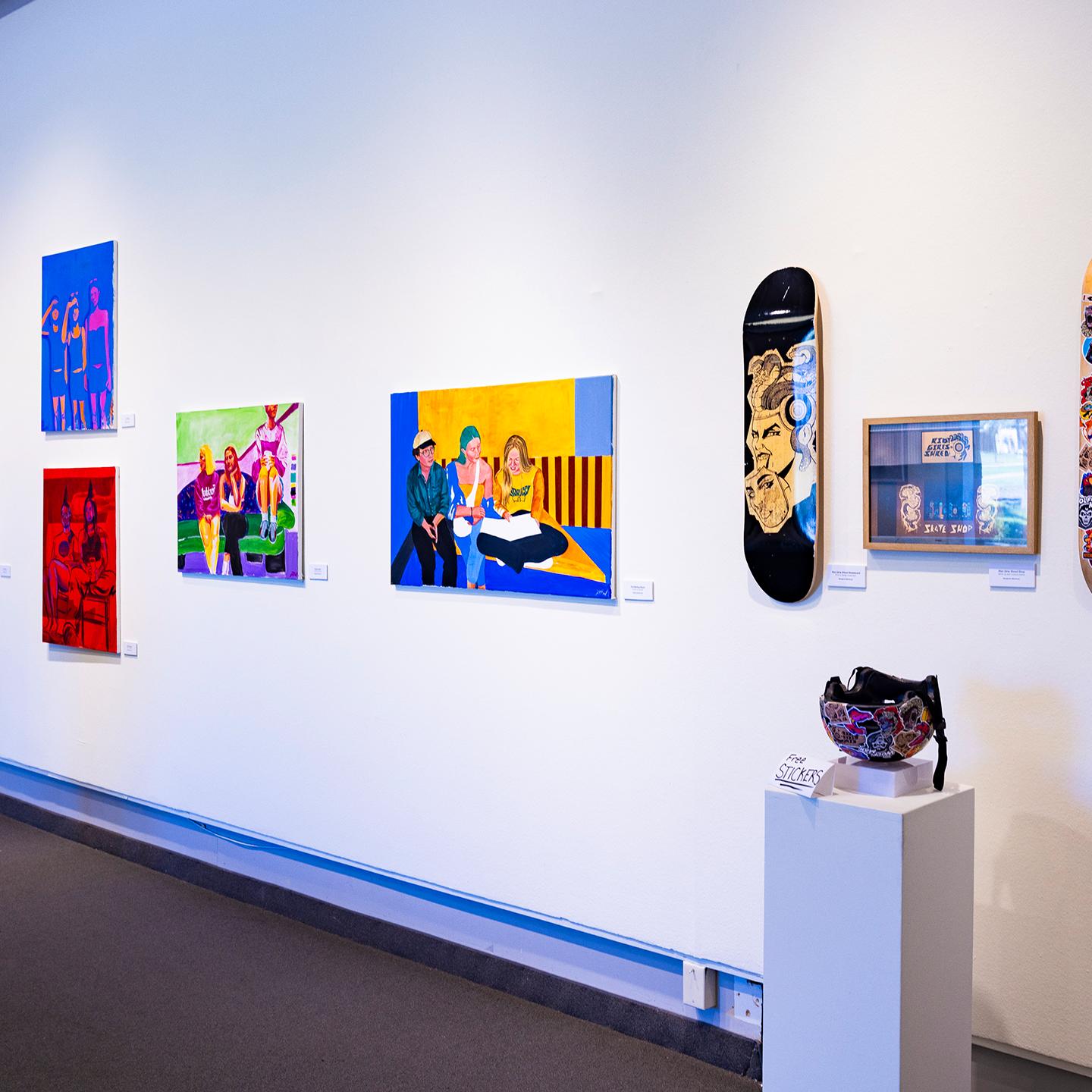a wall with pictures of skateboards on it