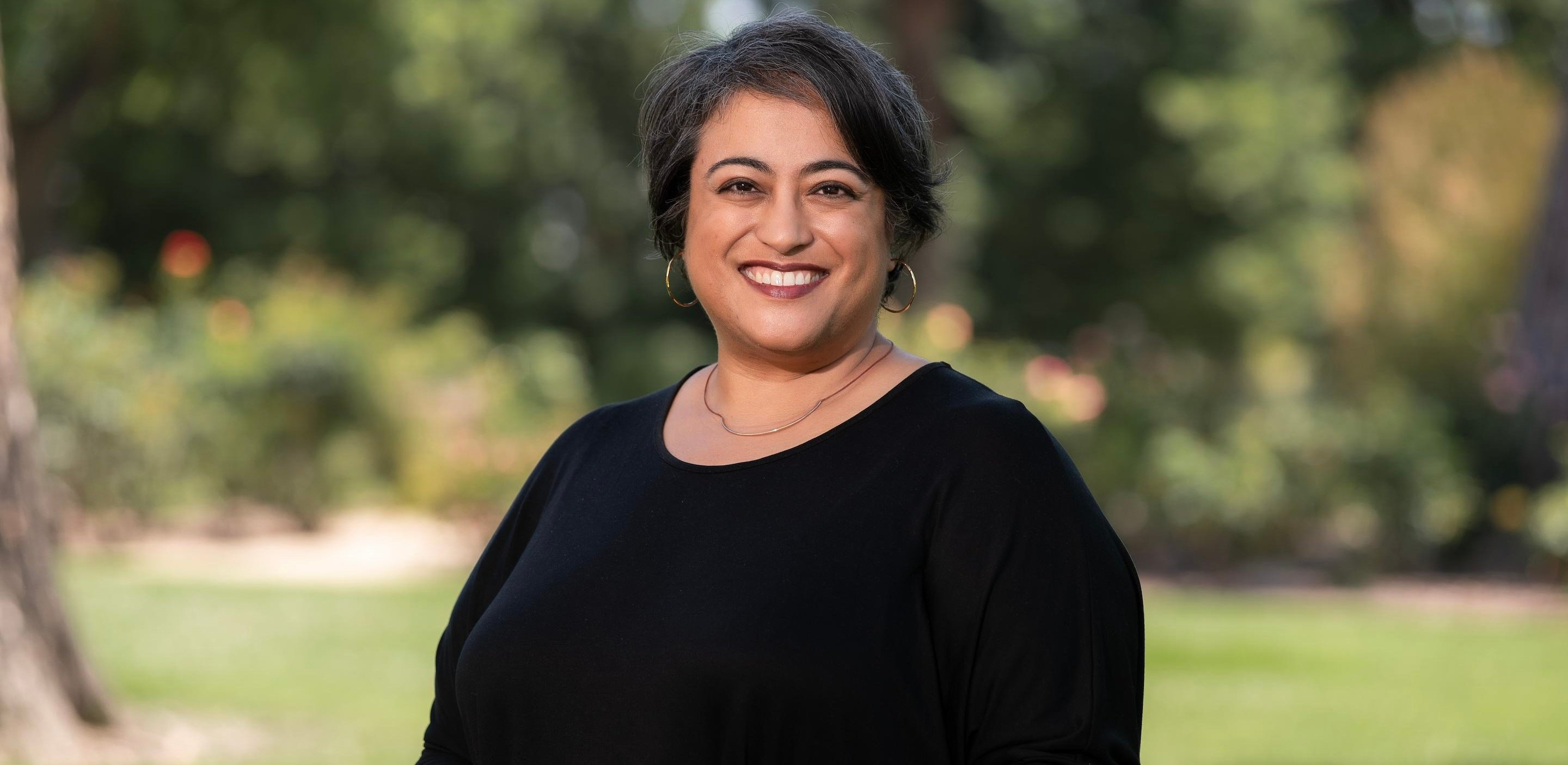 a woman smiling at camera