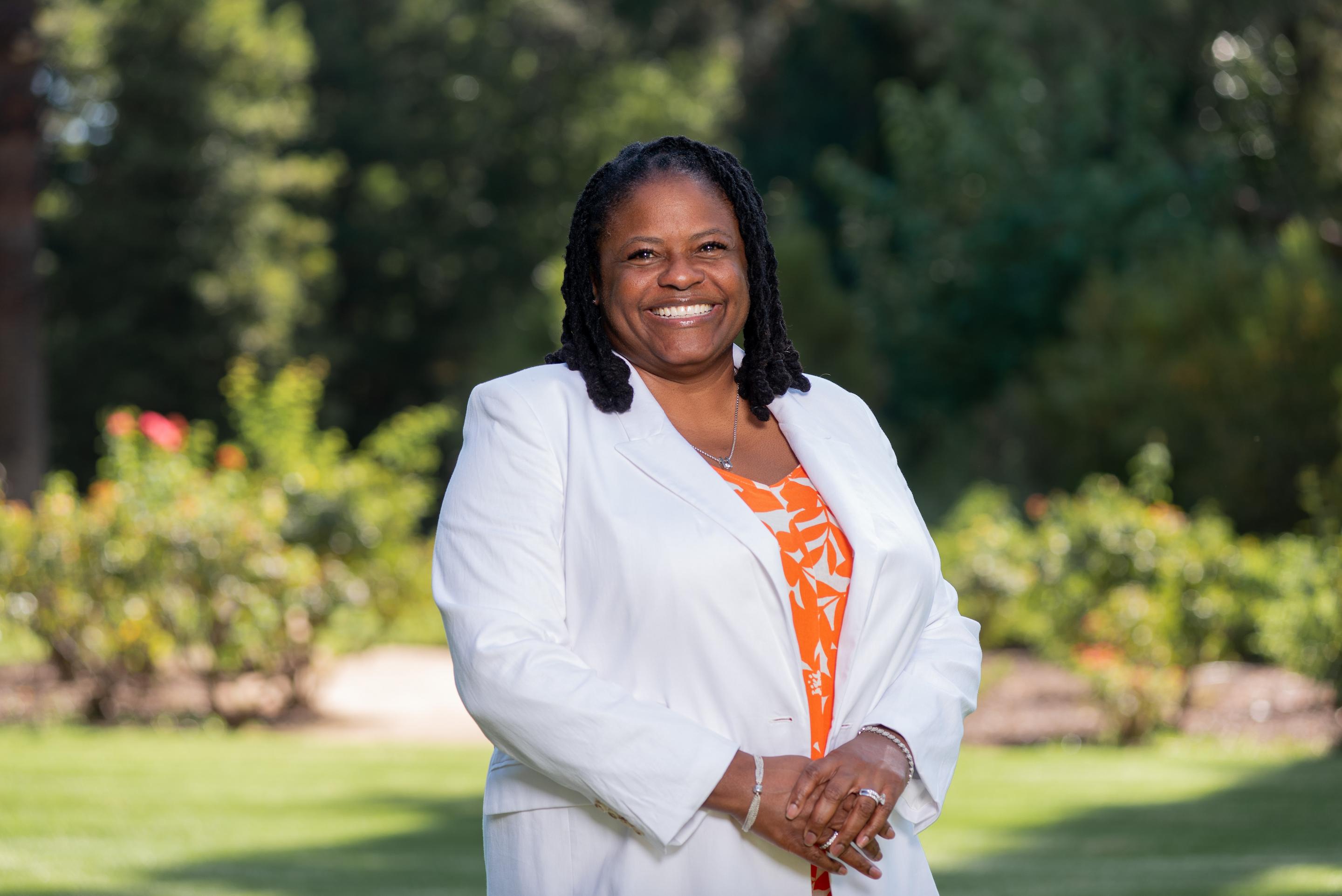 a woman in a white jacket