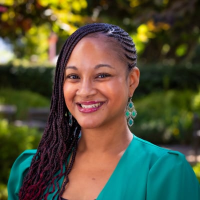 a woman smiling at camera