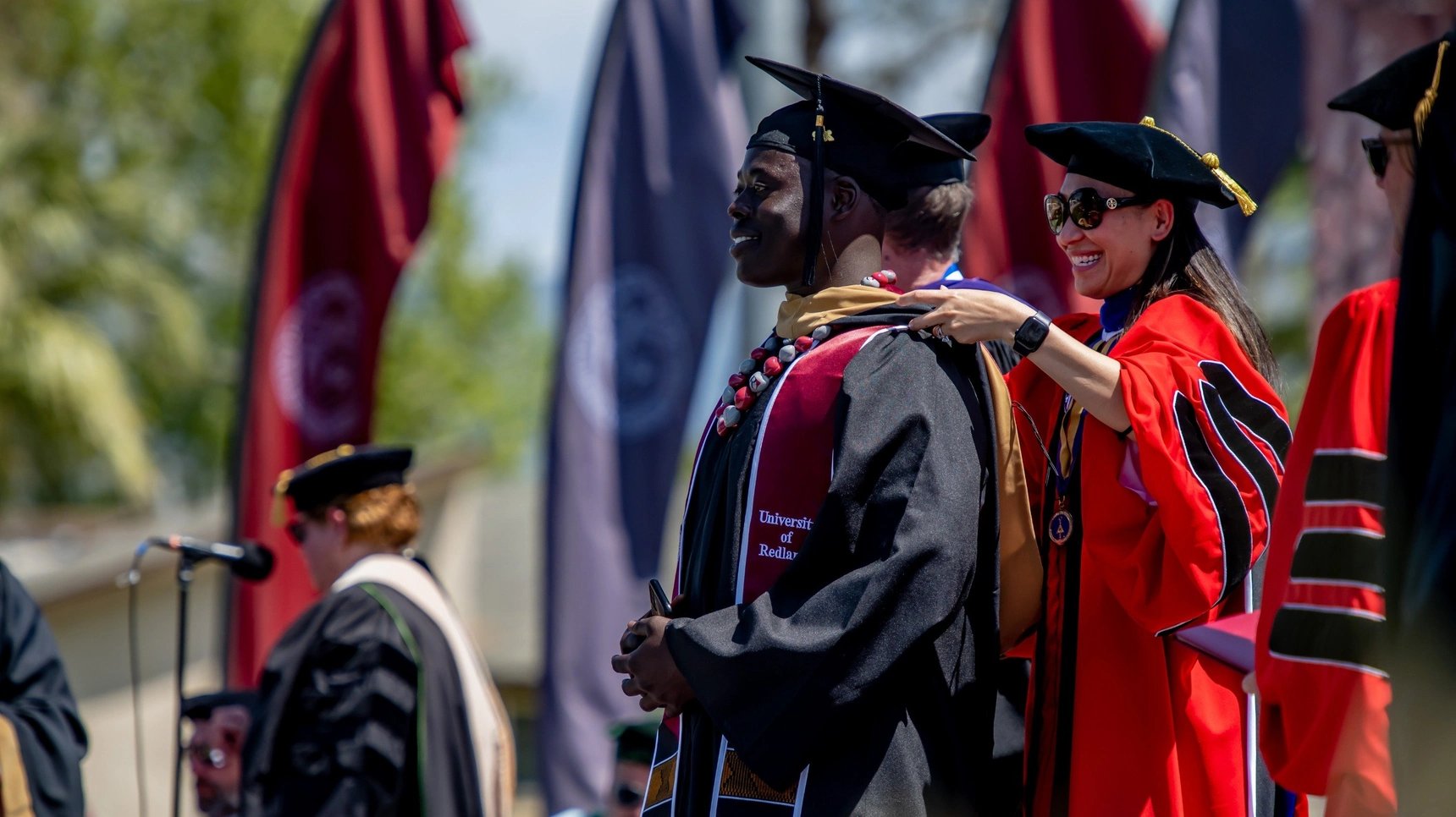 a woman in a graduation gown