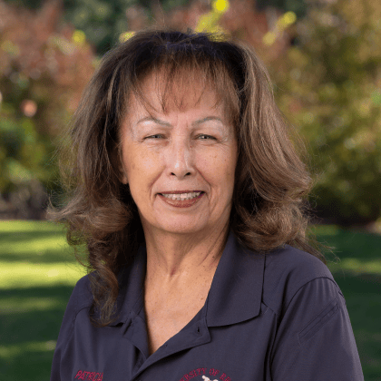 a woman smiling at camera