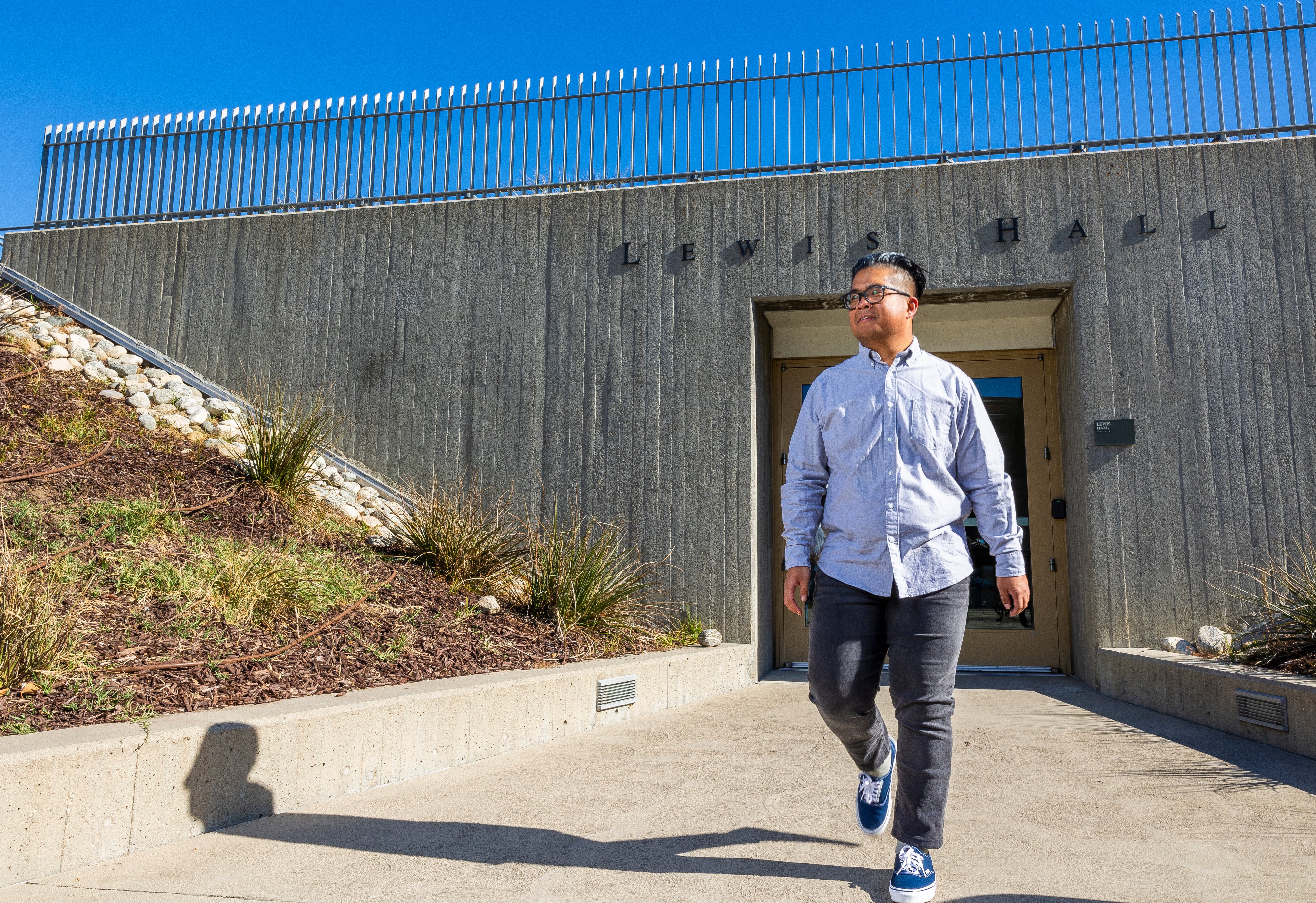 a man walking outside a building