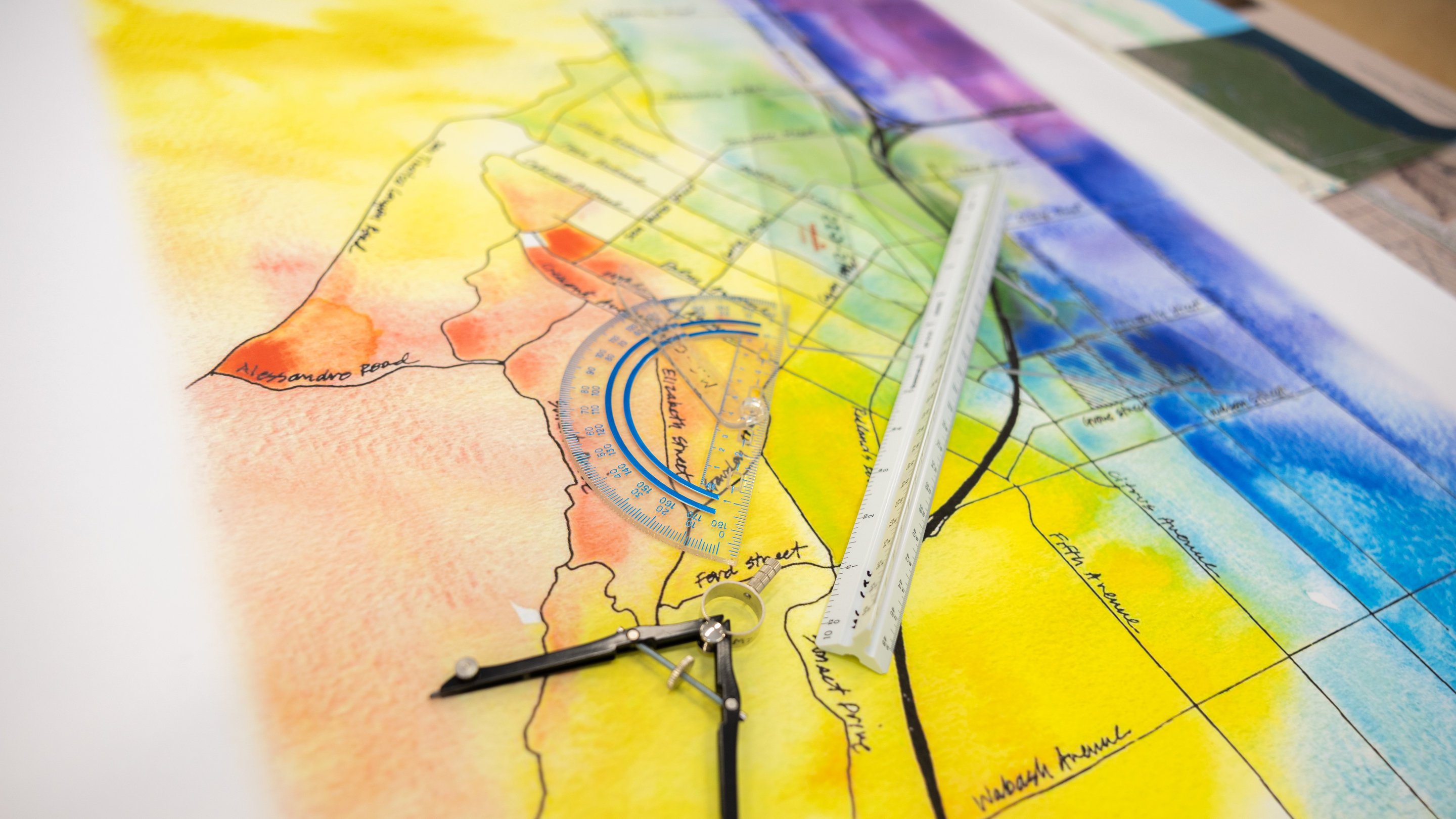 a ruler and compass on a map