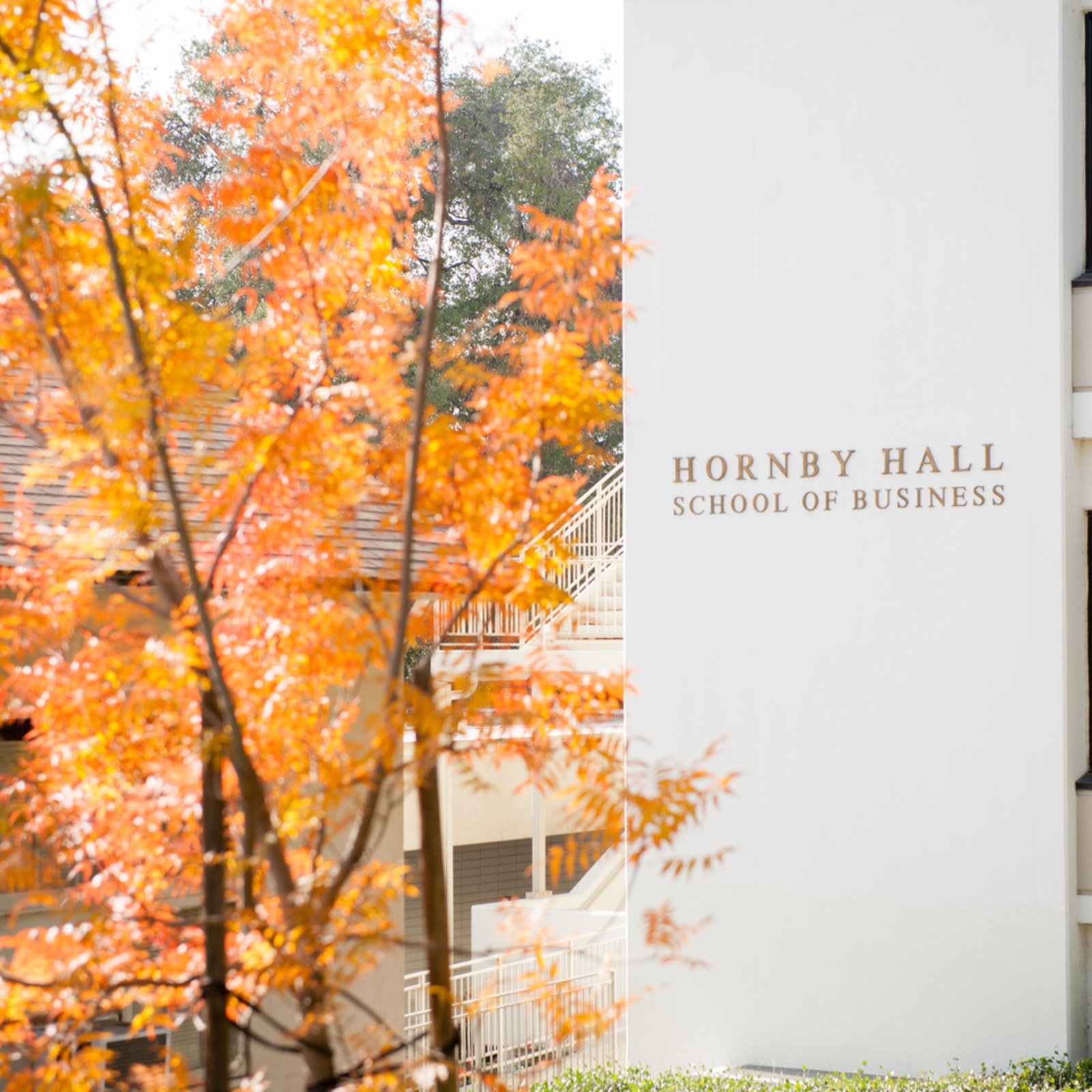 a white building with a sign on it