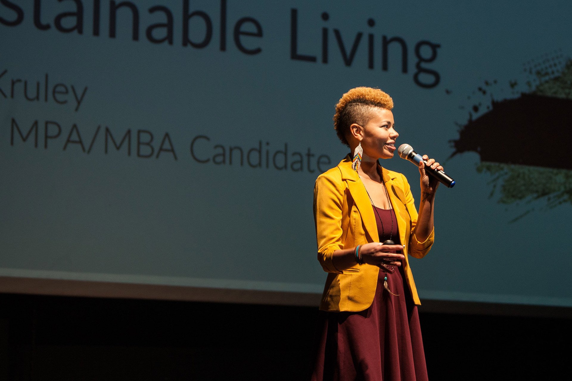 a woman holding a microphone