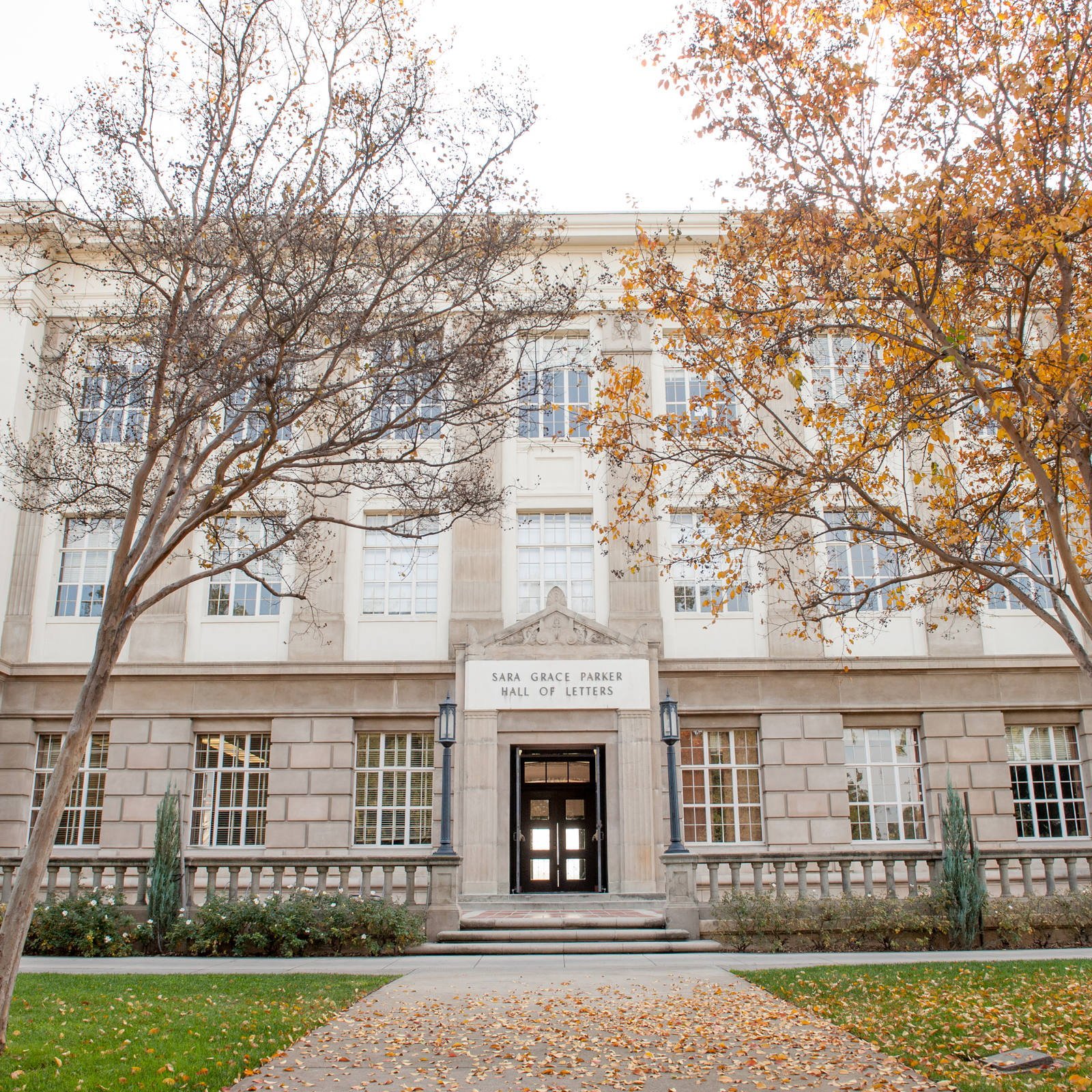 a building with trees in front of it
