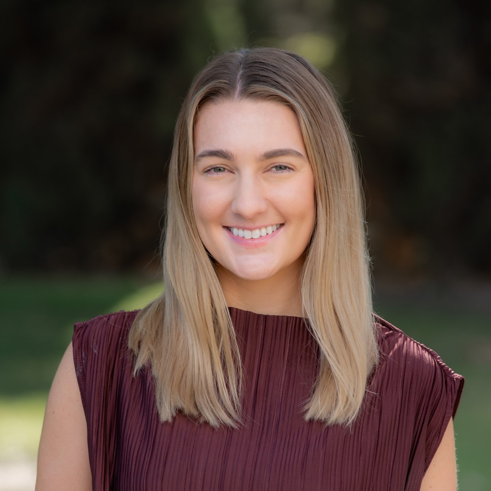 a woman smiling at camera