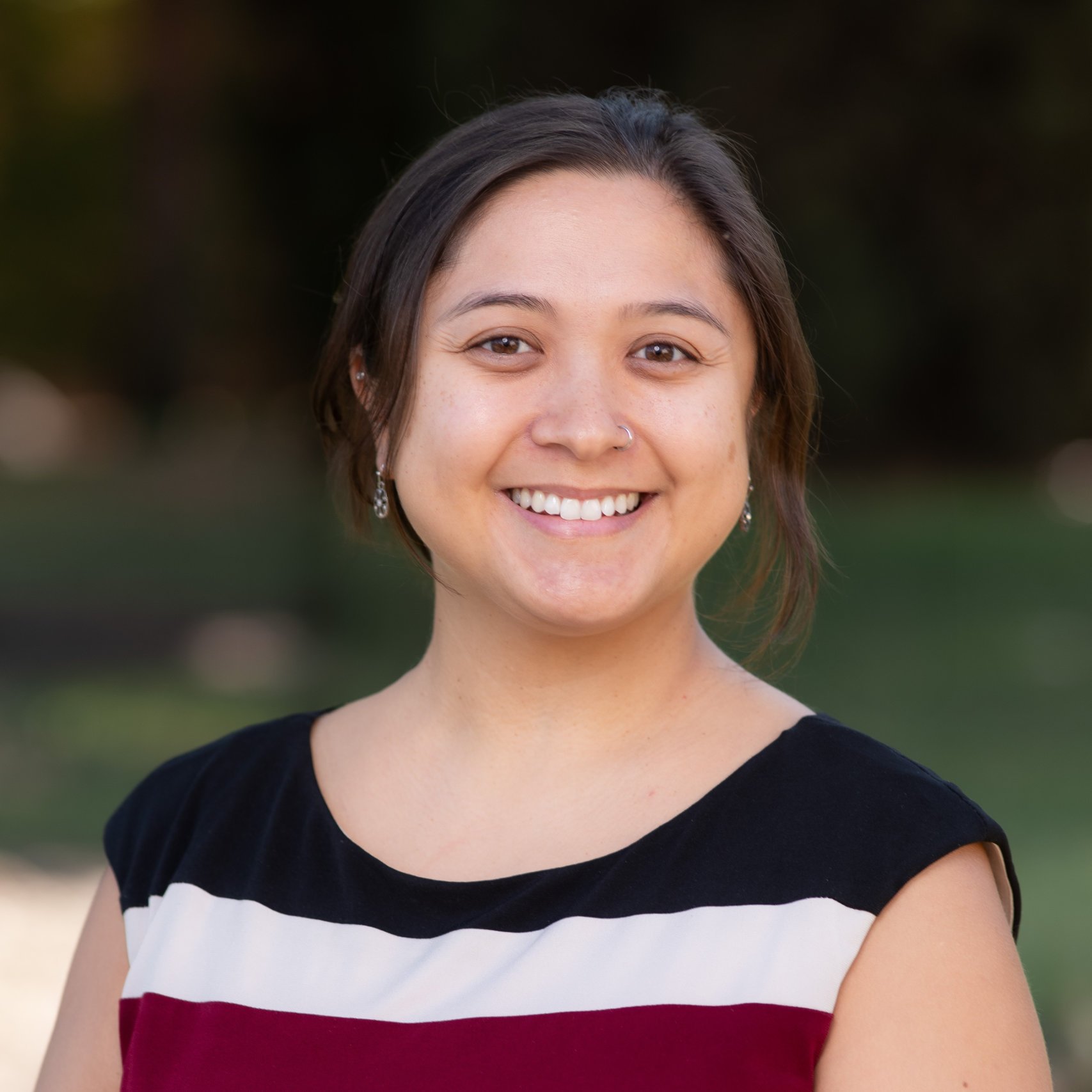 a woman smiling at camera