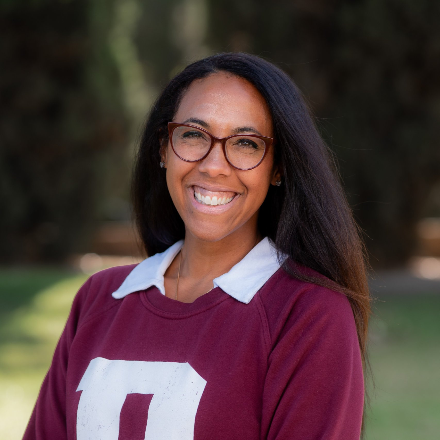 a woman smiling at camera