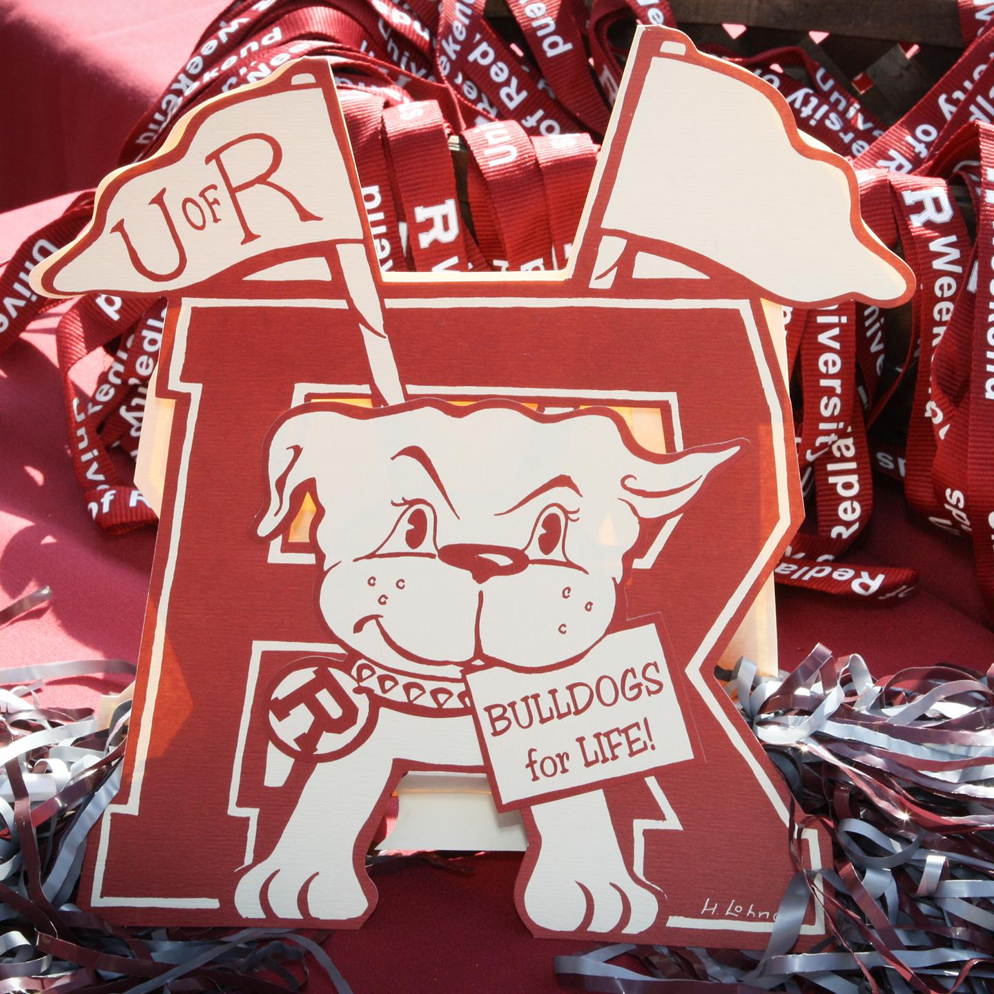 a red and white sign with a dog and flags
