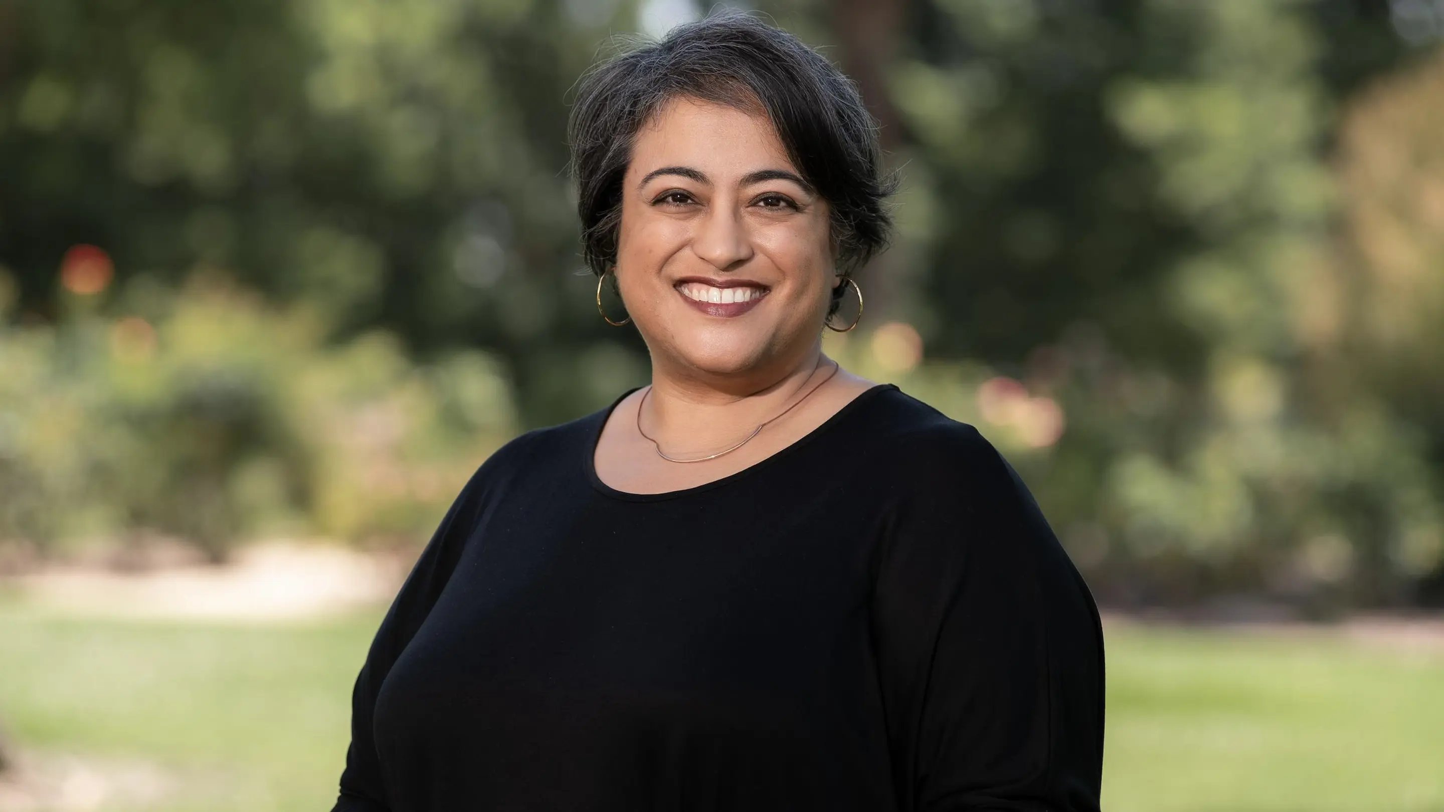 a woman smiling for a picture