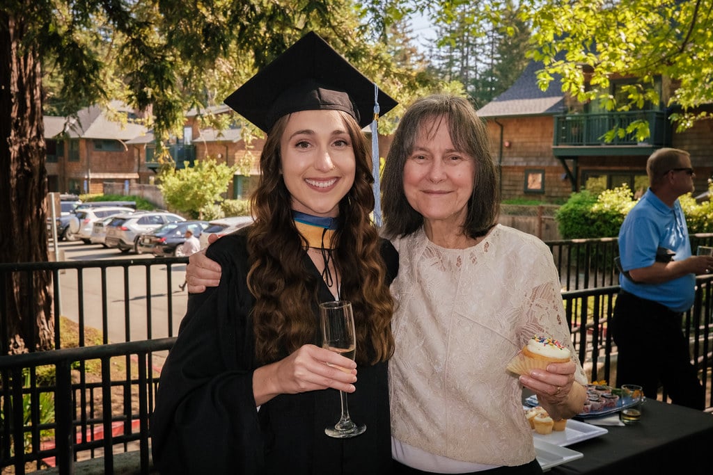 a woman in a cap and gown with a woman in a cap and gown