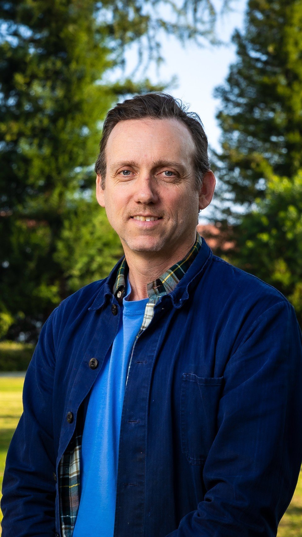 a man in a blue jacket