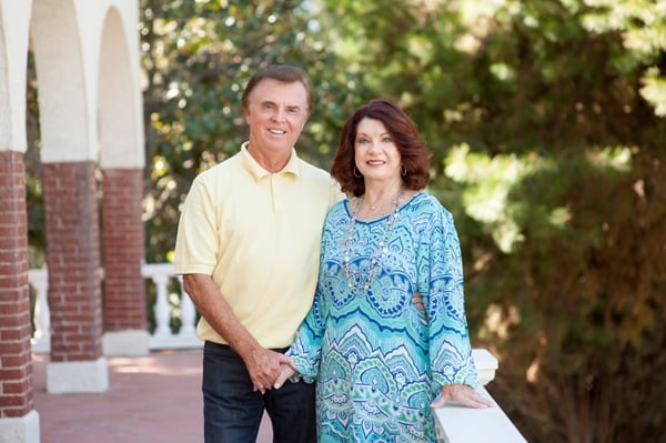 a man and woman holding hands