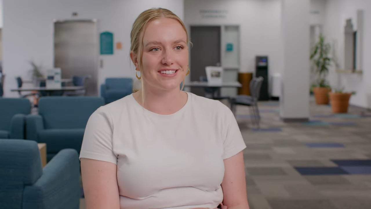 a woman sitting in a room