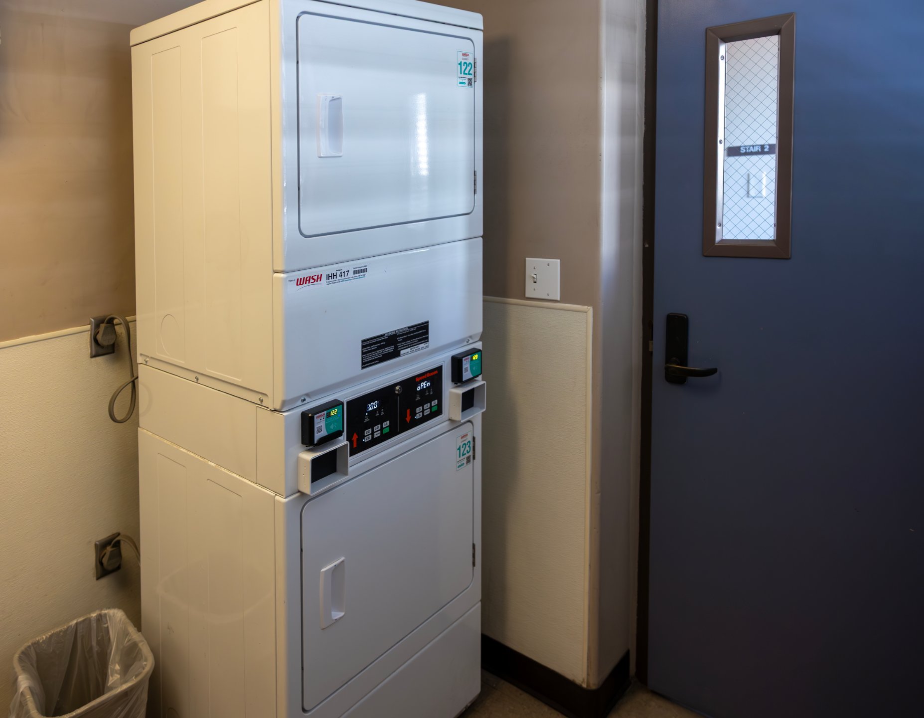 a stack of laundry machines