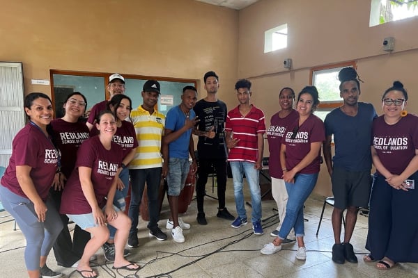 a group of people posing for a photo