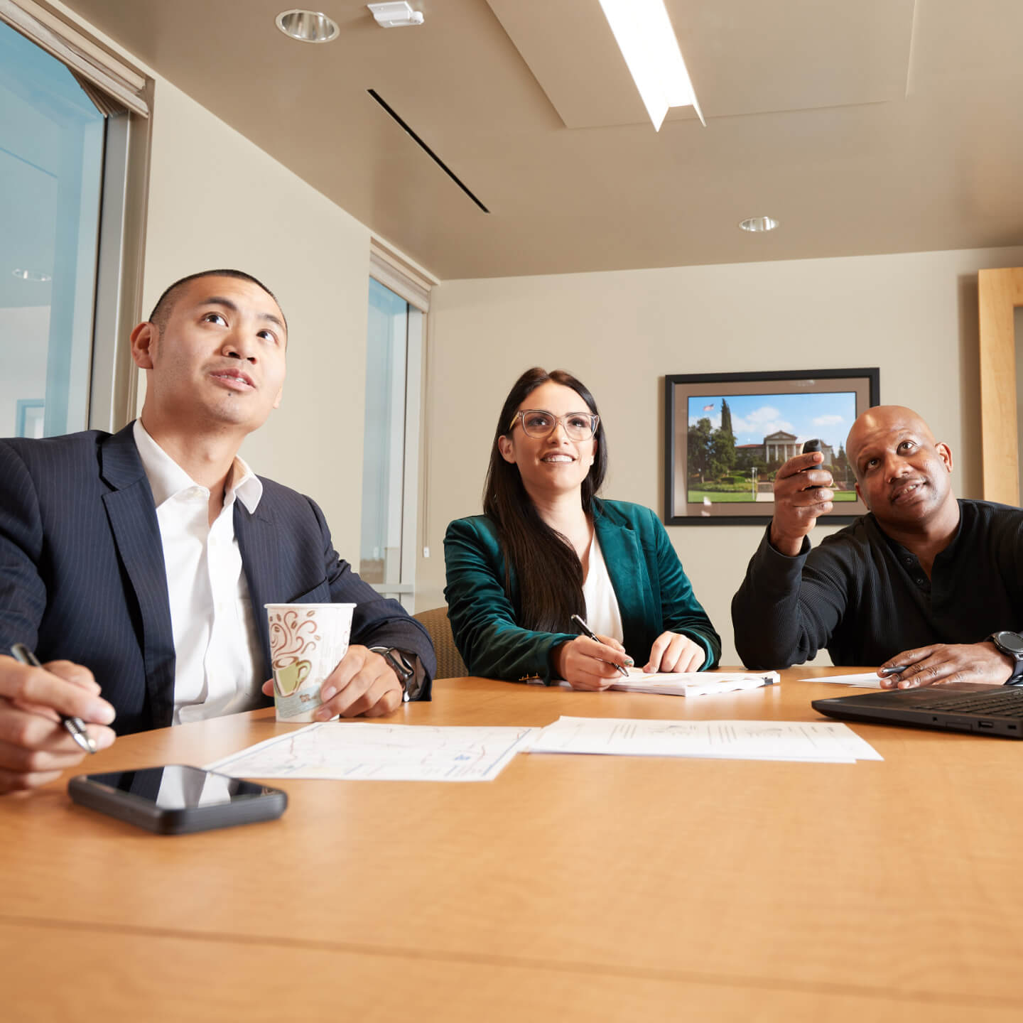 a group of people sitting at a table